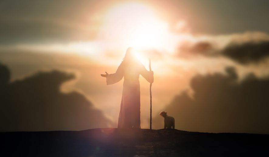 Shepherd Jesus Christ leading the flock and praying to Jehovah God and bright light sun and Jesus silhouette background in the field. File photo credit: artin1 via Shutterstock.