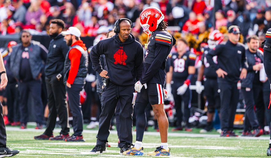 Maryland Terrapins interim coach Aazaar Abdul-Rahim talks with defensive back Jamare Glasker during a game against the Illinois Fighting Illini, Saturday, Oct. 31, 2026, in College Park, Md. (All-Pro Reels).