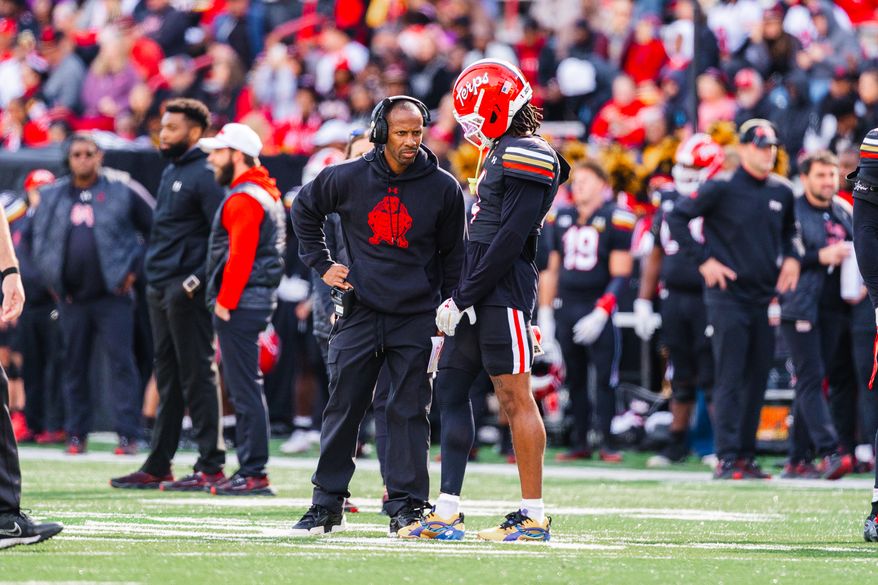 Maryland Terrapins interim coach Aazaar Abdul-Rahim talks with defensive back Jamare Glasker during a game against the Illinois Fighting Illini, Saturday, Oct. 31, 2026, in College Park, Md. (All-Pro Reels).