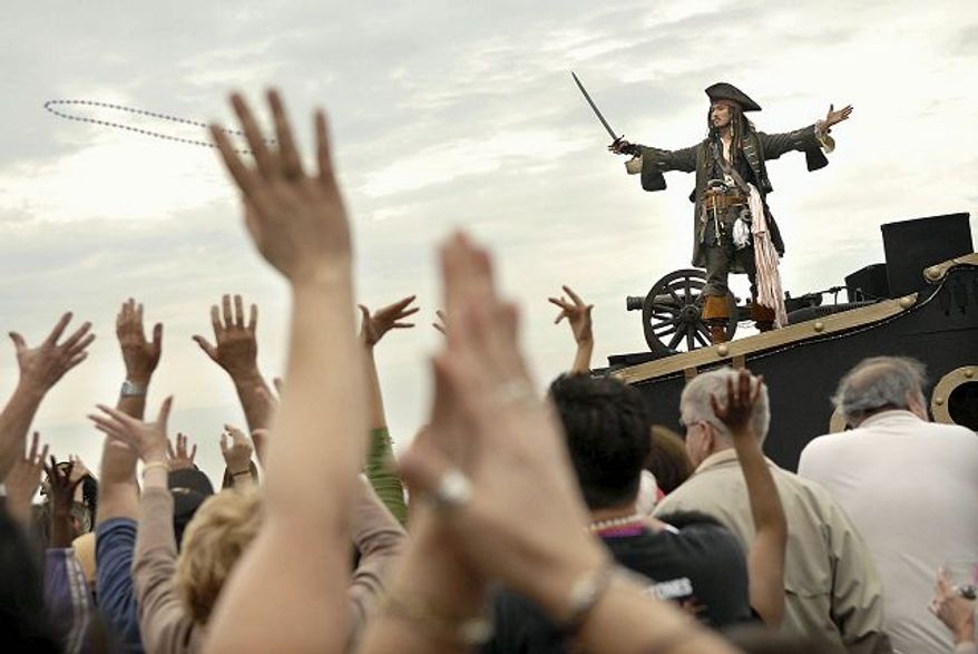 ** FILE ** In this 2008 photo, faux pirates cruised Tampa's waterfront for the city's Gasparilla festival, which drew about 300,000 people. (Rod Lamkey Jr./The Washington Times)