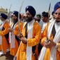 People practicing Sikhism are seen carrying kirpans, which are considered articles of faith. A Sikh student at the University of North Carolina-Charlotte was handcuffed and detained by campus police Thursday over his open carrying of a kirpan, seen as sacred in Sikhism. (Agence France-Presse/Getty Images)