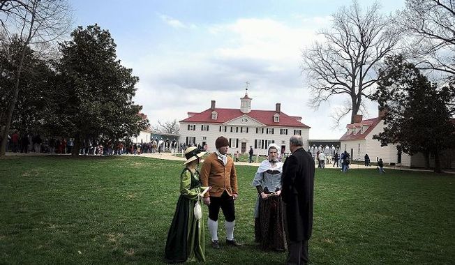 Jim Percoco (far right) visits his students Becky Koenig (second from right), Beth Stinson (left) and Tim Wing (second from left) at Mount Vernon.